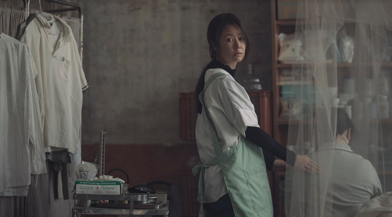 清潔工李雅均（林心如 飾演）